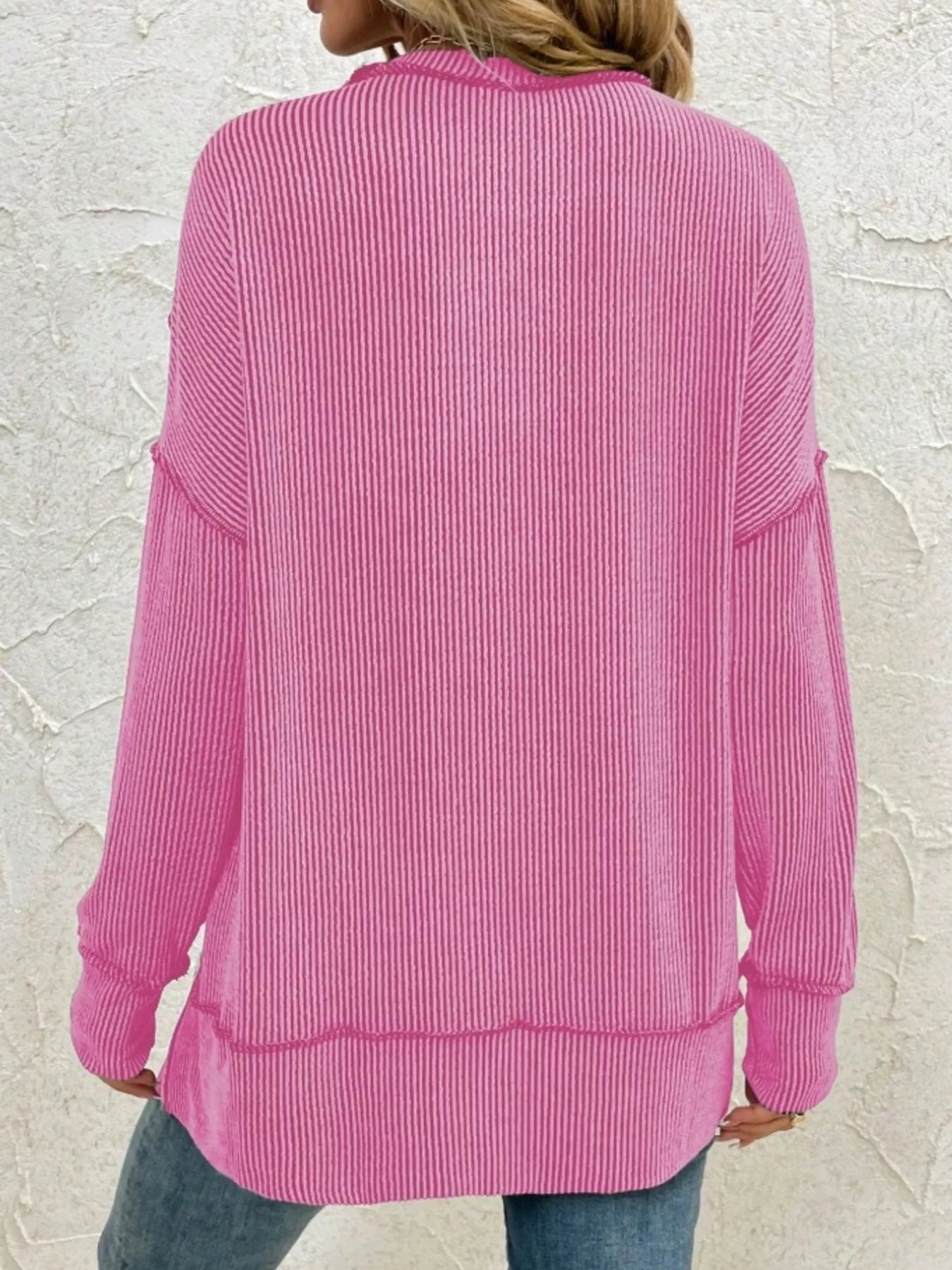 Pink ribbed long sleeve top, cozy women's fashion, back view with relaxed fit