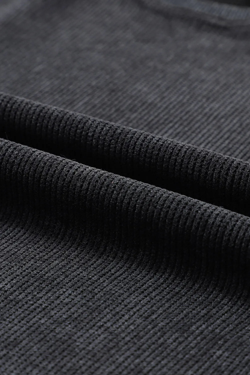 Black ribbed knit fabric texture for women's tops and dresses
