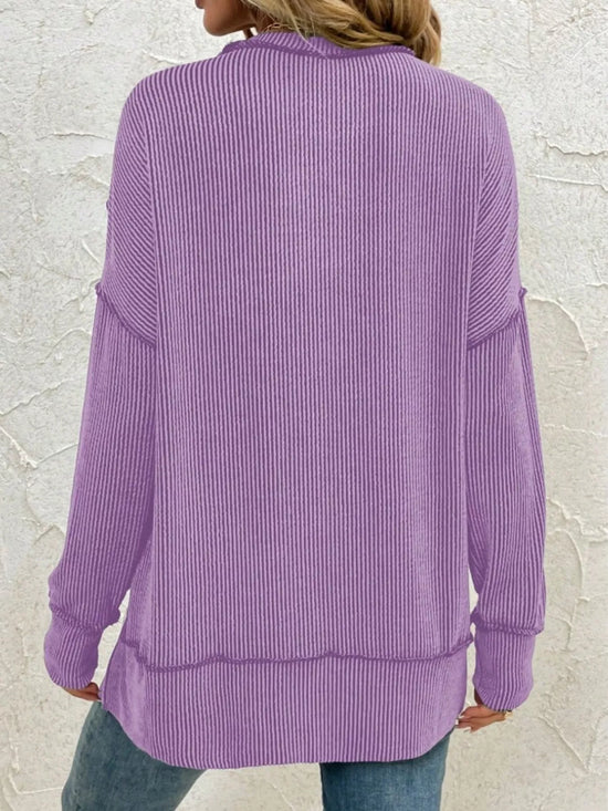 Purple ribbed long sleeve top with relaxed fit, back view
